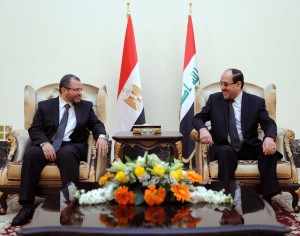 Egyptian Prime Minister Hesham Qandil with Iraqi Prime Minister Nouri Al-Maliki in Baghadad earlier this week. The two sides have signed an agreement which will supply Egypt with 4 million barrels of Iraqi crude oil per month and 4,000 tonnes of diesel per day (AFP Photo) 