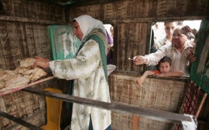 Egypt resumed importing wheat in an attempt to increase its grain stores enough to last until Novembe (AFP Photo)