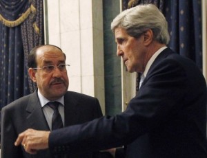 US Secretary of State John Kerry (right) holds talks with Iraqi Prime Minister Nuri al-Maliki in Baghdad, on March 24, 2013. Iraq has said it will step up searches of Iranian flights via its airspace to Syria, days after Kerry publicly criticised Baghdad for turning a blind eye to them  (AFP Photo)