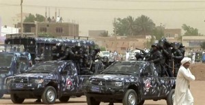 An image grab taken from AFP TV shows Sudanese riot policemen taking position outside the Wad Nabawi mosque in Omdurman on July 6, 2012. (AFP Photo\Stringer)