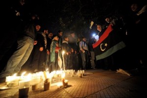 Egyptians will participate in a global candlelight vigil on Thursday demanding a peaceful resolution to ongoing mass bloodshed in Syria, two years after the conflict erupted. (AFP Photo)