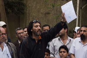 Palestinians displaced from refugee camps in Syria shout slogans against the Palestinian ambassador in Egypt as they rally outside the Palestinian diplomatic mission during a demonstration demanding recognition of their needs by the Egyptian authorities on April 23, 2013 in Cairo.  (AFP Photo)