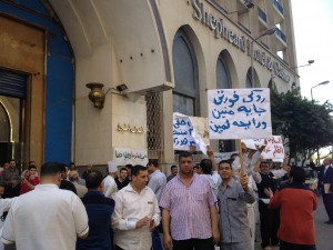 Workers protesting outside the Shepard Hotel demanding their share of 2012 profits and permanent contracts  (Photo by Thoraia Abou Bakr ) 