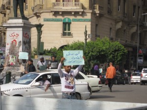 “If you hate Ikhwan, honk your horn” reads the sign (Photo by: Sarah El-Masry) 