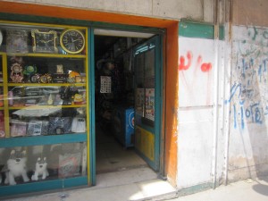 A stationary store similar to the one Om Hamada works at for 300 pounds a month. She refuses to leave her job because it is the only guarantee for her children   (Photo by: Sara El Masry) 