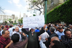 Workers of Al-Nasr Company for Cars protest in April 2011 in front of the cabinet headquarters downtown demanding better salaries (Photo by: Hassan Ibrahim) 