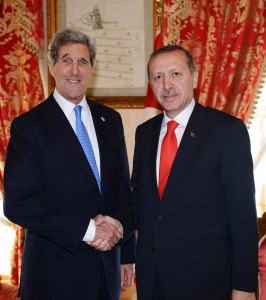 A handout photo provided by the Turkish presidential press service shows Turkish Prime Minister Recep Tayyip Erdogan (R) greeting US Secretary of State John Kerry on April 7, 2013 at Dolmabahce Palace in Istanbul. (AFP Photo)