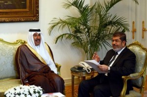 President Mohamed Morsi met Sheikh Hamad bin Jassem bin Jabr al-Thani in Cairo on 6 September 2012  (AFP Photo/Khaled Desouki) 
