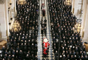 The Bearer Party made up of personnel from the three branches of the military carry the coffin of British former prime minister Margaret Thatcher out of St Paul's Cathedral at the end of her ceremonial funeral in central London on April 17, 2013. (AFP Photo)