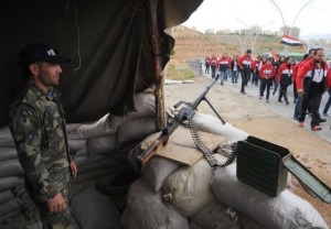 The Damascus Youth volunteer group visits a Syrian army checkpoints in the capital, on April 17, 2013 (Sana/AFP/File) 