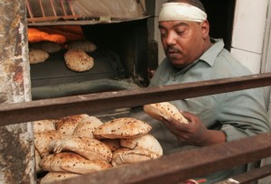 Mahmoud Abdel Aziz, director of Cairo’s Supply Directorate, stated that 93% of bakeries in the governorate will employ a new system for baking, and that teams of inspectors and civil society organisations would be mobilised to regularly monitor bakeries in order to make sure that they meet all the required specifications as agreed upon by law (AFP Photo)