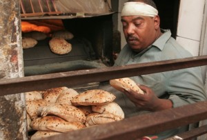 The Egyptian government announced a decision to cut wheat imports this year by around 10%, relying on what it has called “a large domestic wheat harvest” in the upcoming six weeks. (AFP Photo)