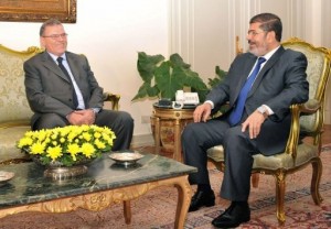  President Morsi  with Libyan Foreign Minister Ashur bin Khayal at the presidential palace in Cairo last July.  