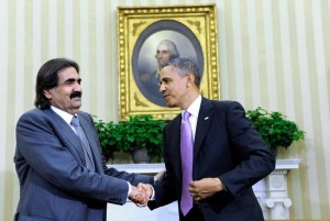 US President Barack Obama shakes hands with the Emir of Qatar Sheikh Hamad bin Khalifa al-Thani at the end of their meeting in the Oval Office of the  White House in Washington on 23 April 2013.(AFP Photo)