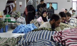 Over 350 Egyptian workers were reinstated on Tuesday, having been dismissed from their jobs on Sunday for demanding higher wages and better working conditions. (AFP Photo) 