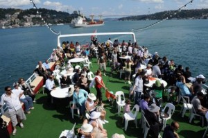 Tourists travel by boat during a tour on the Bosphorus in Istanbul on August 12, 2009 (AFP/File Photo/Bulent Kilic)