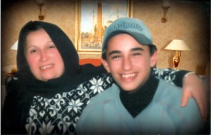 Khaled Saeed as a young boy with his mother (Photo from Waledat Khaled Saeed Facebook Page )