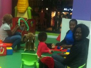 Nigerian maids babysitting children in a kid’s area inside a shopping mall  (Photo by: Ethar Shalaby) 