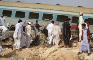 Egyptians inspect the wreckage of a train at the site of a transport accident near the Mediterranean city of Marsa Matruh in 2008, about 37 people were killed and 38 injured  (AFP Photo / Stringer ) 