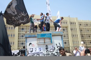 The 6 April Democratic Front have held a protest outside the New Cairo Court in the Fifth Settlement, where activists are facing trial on 30 April 2013. (Photo by Ahmed Al Malky)