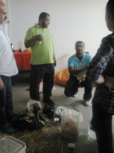 Instructor Hani Al Khodary and participants prepare the compost bin (Photo by Fanny Ohier) 