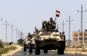 Egyptian soldiers are deployed in the area of the Rafah Crossing border between Egypt and the Gaza Strip on May 21, 2013 as Egypt intensified efforts to secure the release of seven security personnel captured in the Sinai. (AFP Photo)