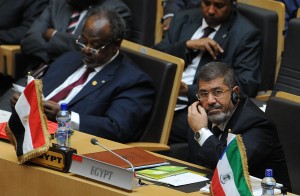 Egyptian President Mohamed Morsi (R) and his Djiboutian counterpart Mohammed Guelleh attend the 50th jubilee's ceremonies of the African Union, with Africa's myriad problems set aside for a day to mark the progress that has been made. (AFP Photo)
