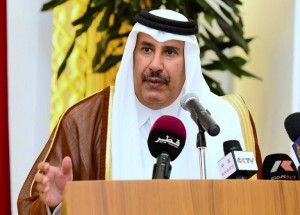 Qatar's Premier and Foreign Minister Sheikh Hamad bin Jassem bin Jabr al-Thani speaks during a joint press conference with Egyptian Prime Minister Hisham Qandil in Doha on April 10, 2013. (AFP File Photo)