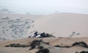 Egyptian soldiers take position on a sand dune during an operation in the Sinai peninsula (AFP/File) 