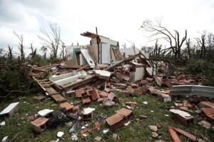 A home sits damaged on May 20, 2013, after a tornado moved through the area near Shawnee, Oklahoma, the day before (Getty Images/AFP/File, Brett Deering)