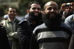 A bearded Egyptian police officer takes part in a protest by Salafists demonstrating over a lack of enforcement of a recent court order permitting bearded police officers to serve in Cairo on March 1, 2013.( AFP File Photo)
