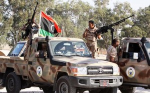 Soldiers in pickup trucks mounted with machineguns and anti-aircraft weapons were deployed in Tripoli (AFP Photo)